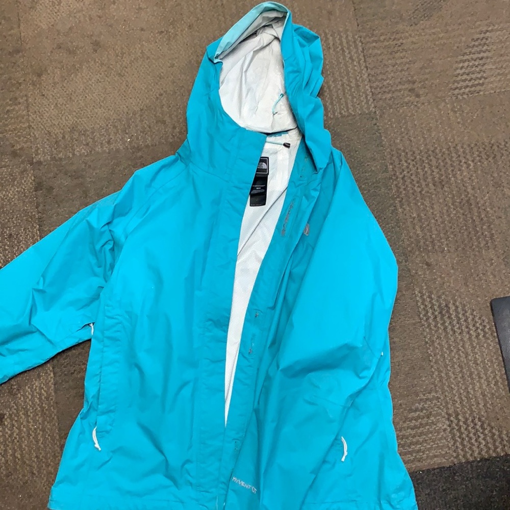 Women’s Medium teal North Face rain jacket